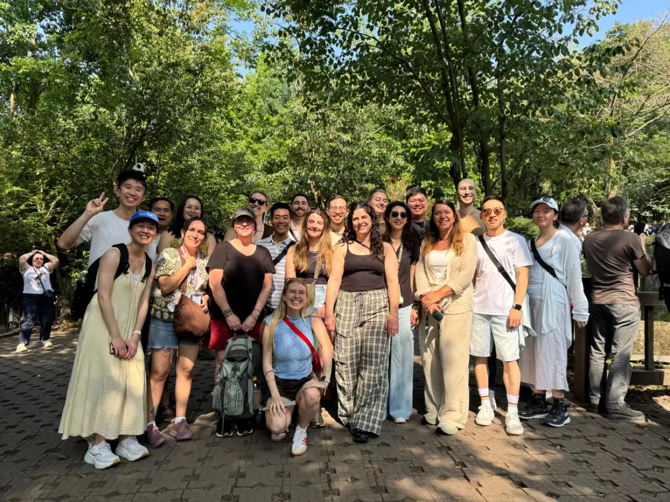 Southwest tour group portrait in a leafy park