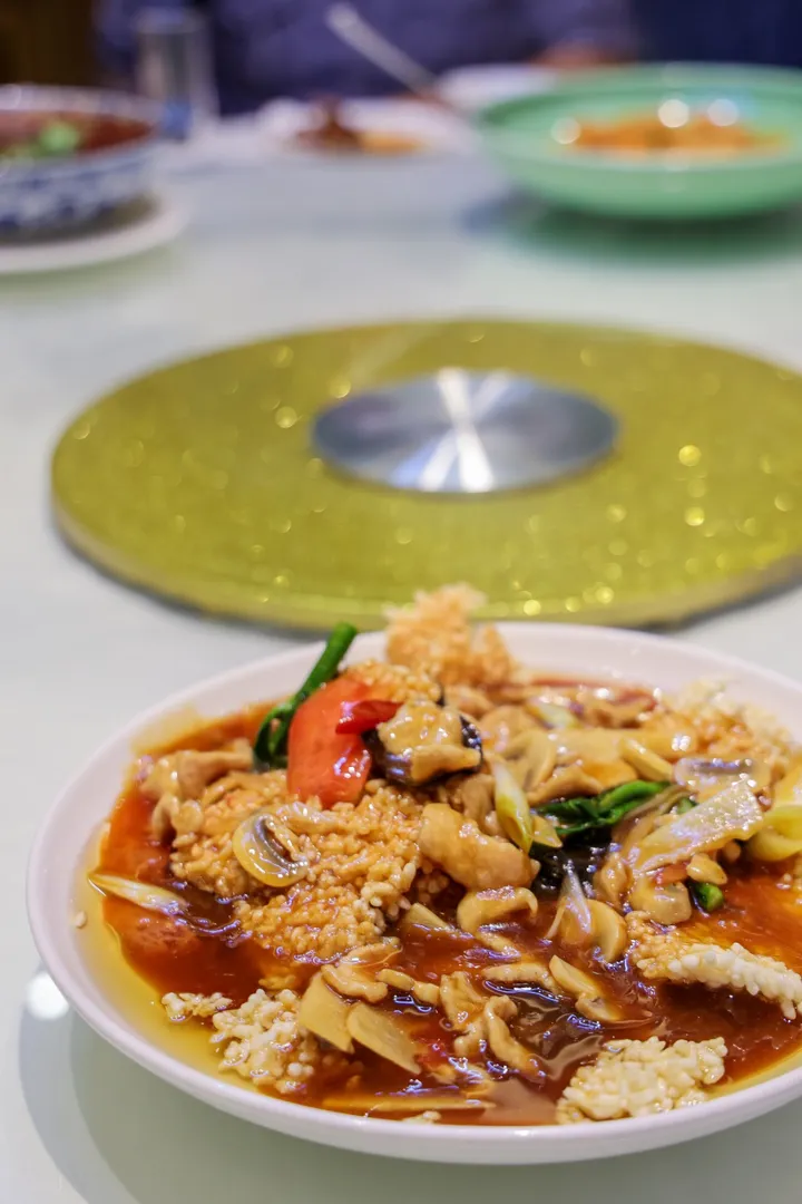 Sweet and sour crispy rice dish on a lazy susan